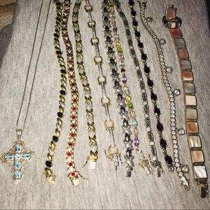 10 bracelets, 1 necklace, 1 matching ring
